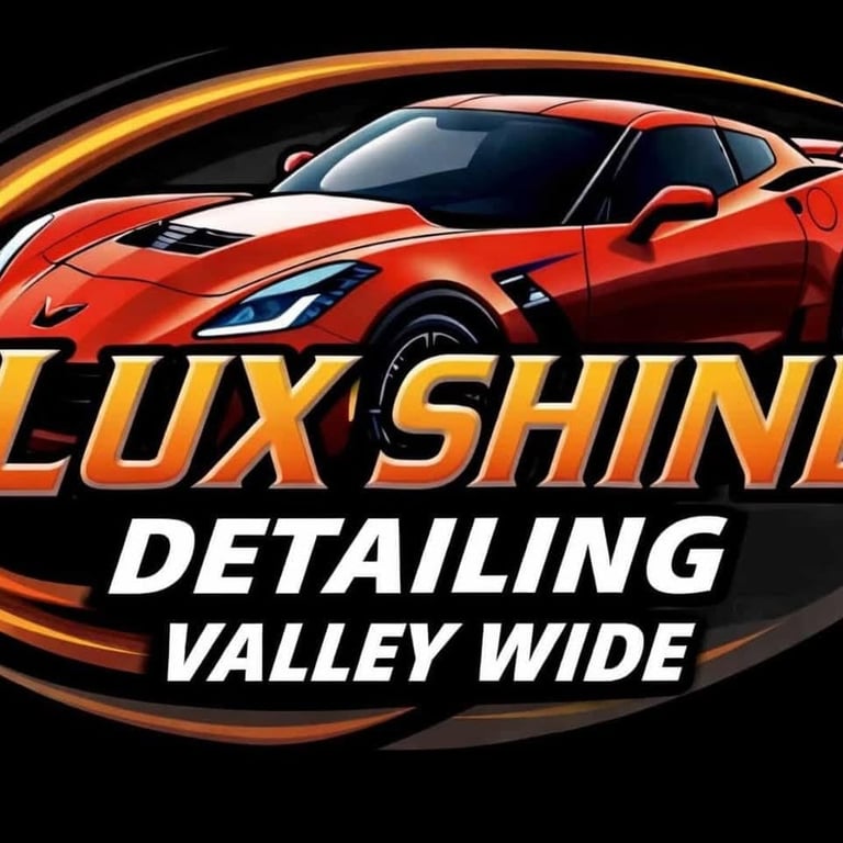 Lux Shine Detailing Valley Wide logo featuring a red sports car with orange and gold accent swooshes on black background